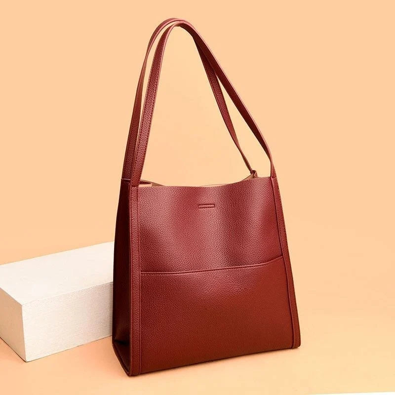 – Plain shoulder bag made of genuine leather